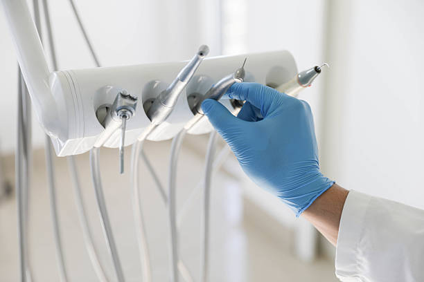 Professional Invisalign Clear Aligners technician working in Roslyn, NY